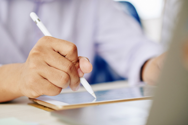 man-working-tablet-with-stylus 1